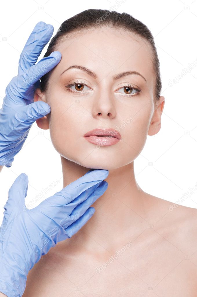 Beautician touch and exam health woman face