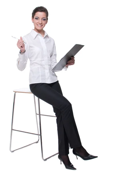 Portrait of young emotional business woman on chair — Stock Photo, Image