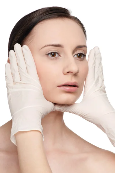 Beautician touch and exam health woman face. — Stock Photo, Image