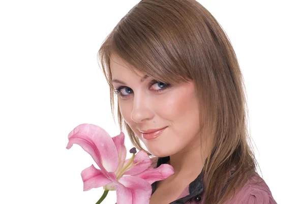 Close-up van portret van jonge mooie vrouw met bloem — Stockfoto