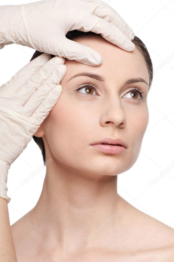 Beautician touch and exam health woman face.