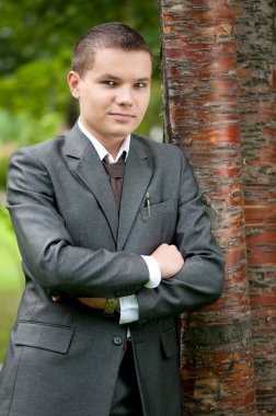 Business man waiting at park. Student clipart