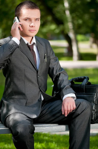 Business man talk by mobile phone. Student — Stock Photo, Image