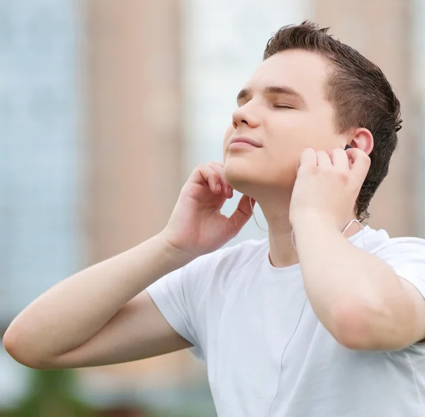 Young attractive man with headphones — Stock Photo, Image