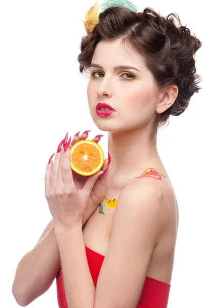 Close up portrait of beauty woman with fruit bodyart and orange — Stock Photo, Image