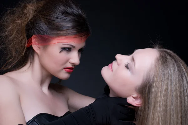 stock image Closeup portrait of two girls: good & evil