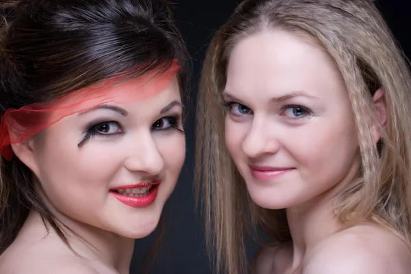 Closeup portrait of two girls: good & evil — Stock Photo, Image