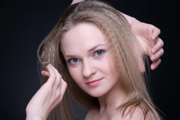Close up portrait of beautiful blond girl on black — Stock Photo, Image