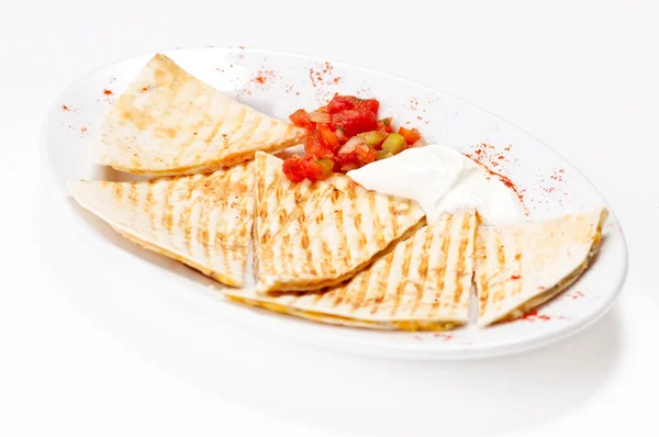 Breakfast Quesadilla with Sour Cream and vegetables on plate. Isolated on w — Stock Photo, Image