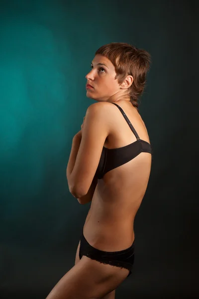 Young woman in a swimsuit — Stock Photo, Image