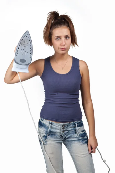 Young brunette girl with iron — Stock Photo, Image