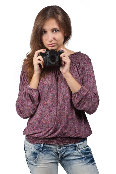 Menina morena nova com uma câmera — Fotografia de Stock