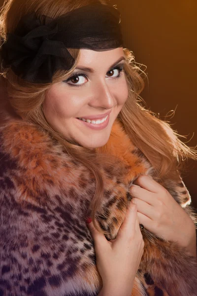 Young beautiful woman in black hat — Stock Photo, Image