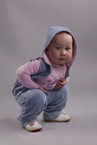 A baba egy rózsaszín ruha — Stock Fotó