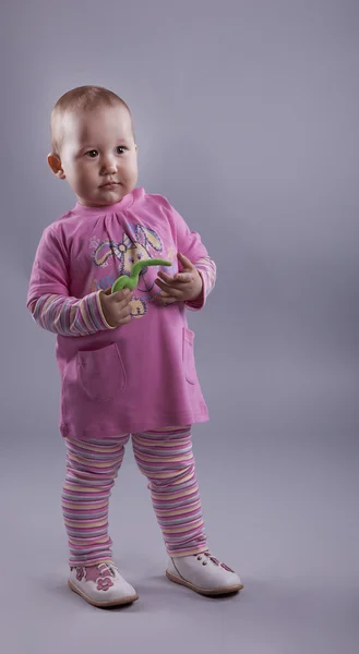O bebê em um vestido rosa — Fotografia de Stock