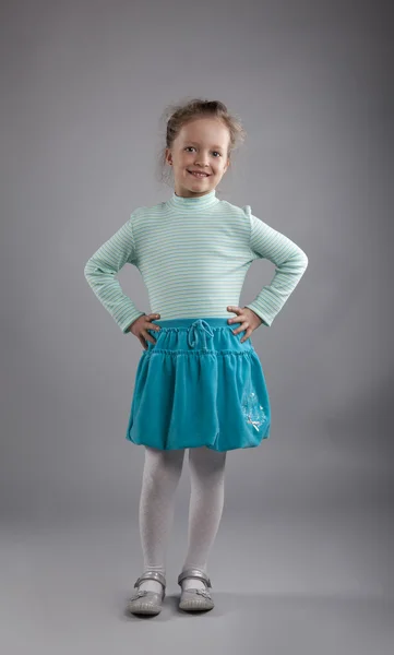 Cute little girl in blue dress — Stock Photo, Image