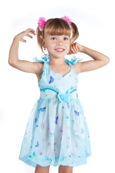 Kék ruhát egy aranyos kislány portréja — Stock Fotó