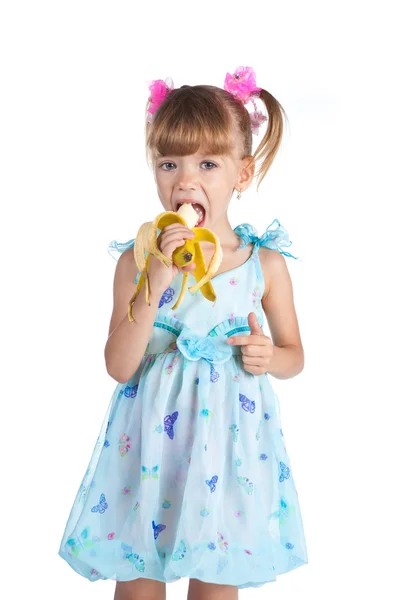 그녀의 손에 바나나와 파란 드레스에 예쁜 여자 — 스톡 사진