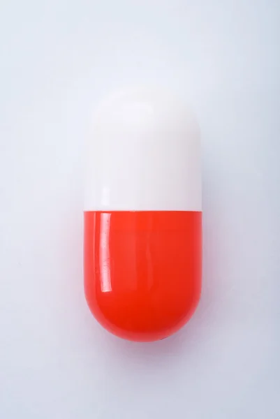 Red capsule — Stock Photo, Image