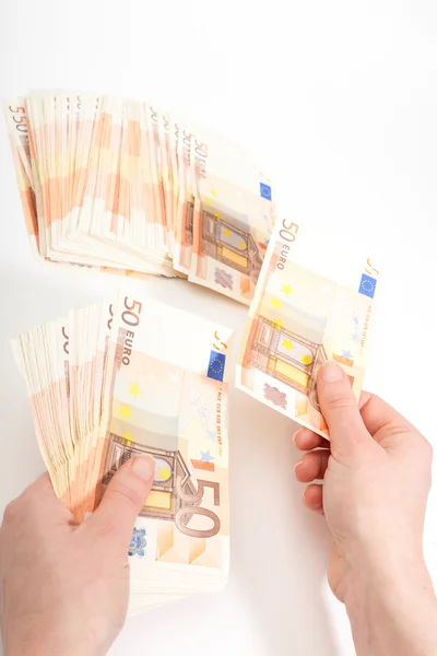 Counting euros in denominations of 50 — Stock Photo, Image