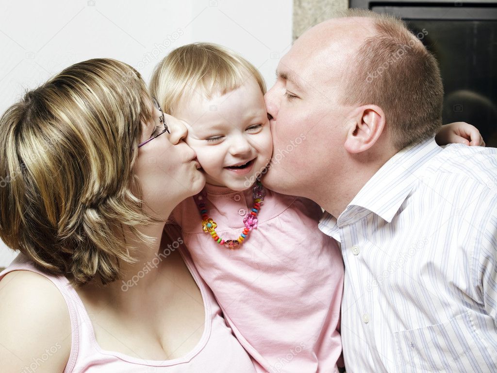 Spontaneous affectionate young family
