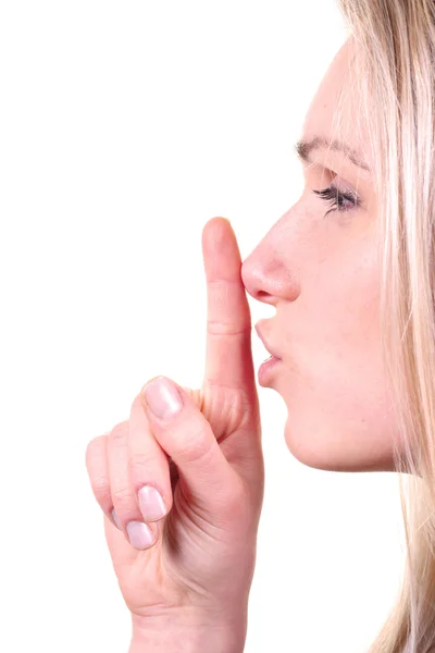 Тсс - женщина с пальцем перед губами — стоковое фото