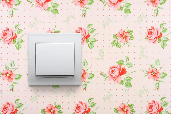 Interruptor de luz no papel de parede floral retro Fotografias De Stock Royalty-Free