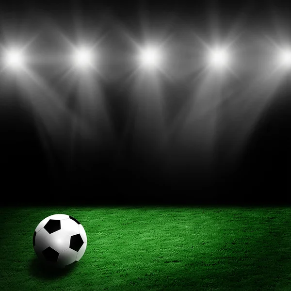 Soccer ball on the stadium lawn — Stock Photo, Image