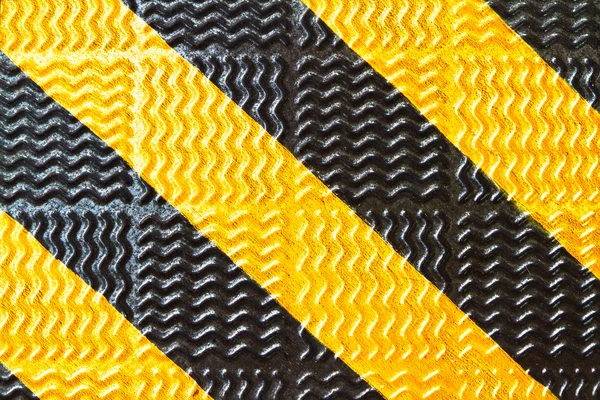 Línea amarilla y tira negra — Foto de Stock
