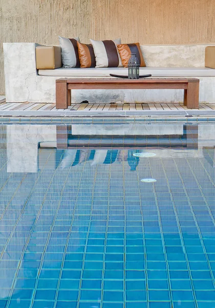 Sofa and pool — Stock Photo, Image