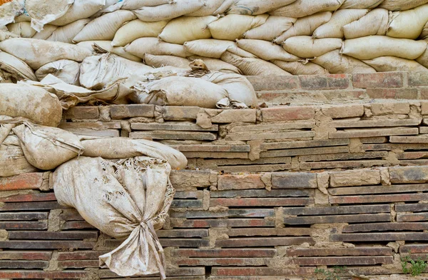 stock image Stack of old sand bags