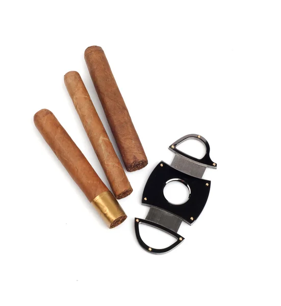 Cigars and a cutter isolated on white background — Stock Photo, Image