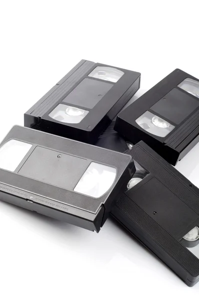Pile of video cassettes isolated on white background. — Stock Photo, Image