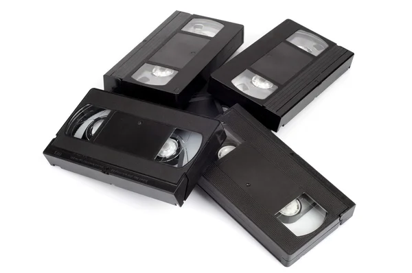 Högen av videokassetter isolerad på vit bakgrund. — Stockfoto