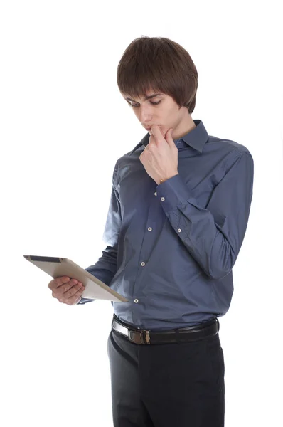 Young Businessman think about something with tablet in his hand — Stock Photo, Image