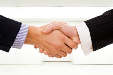 Handshake of business partner after the deal clipart