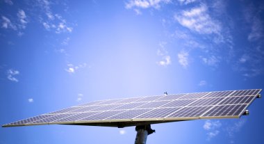 Solar panel against blue sky clipart