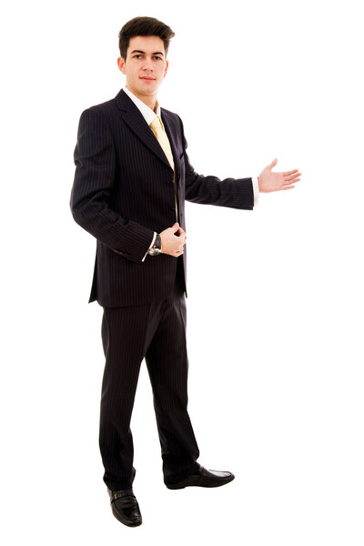 Young business man full body presenting over a white background