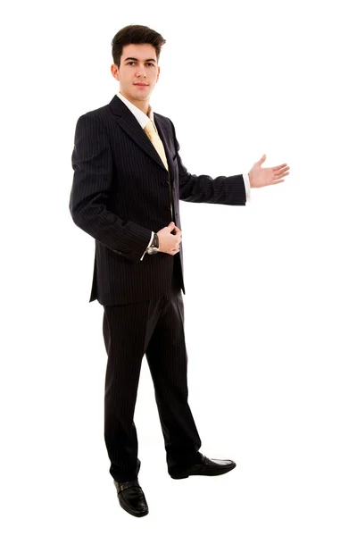 Joven hombre de negocios presentando sobre un fondo blanco — Foto de Stock