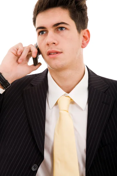 在电话里被隔绝在白色的年轻商业男人 — 图库照片