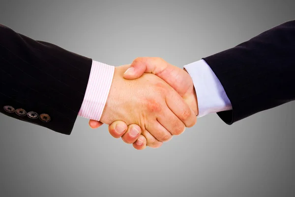 Imagem de perto de empresários apertando as mãos, fazendo um acordo — Fotografia de Stock