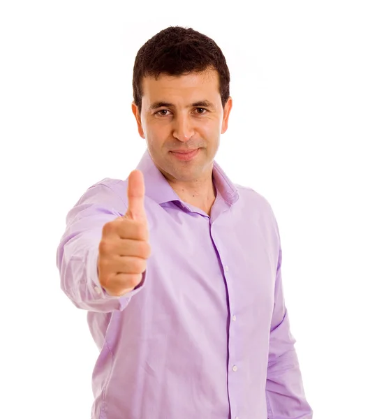 Щасливий випадковий молодий чоловік показує великий палець і посміхається. ізольовані на — стокове фото