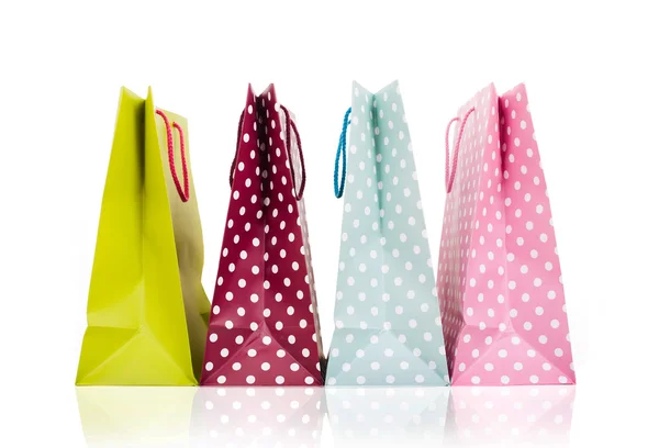 Assortiti borse della spesa colorate su sfondo bianco — Foto Stock