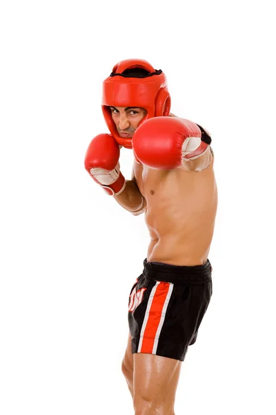 与拳击头盔和手套 ov 年轻拳击手战斗机的肖像 — 图库照片