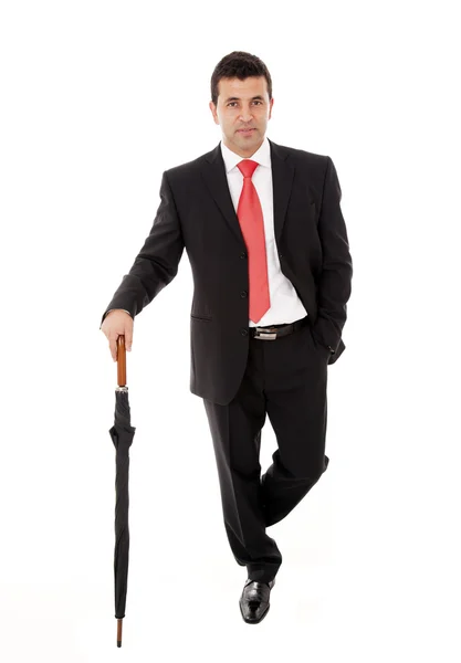 Young business man with umbrella on white background — Stock Photo, Image
