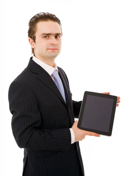 Sonriente joven hombre de negocios mostrando tableta pc. Aislado sobre el blanco —  Fotos de Stock