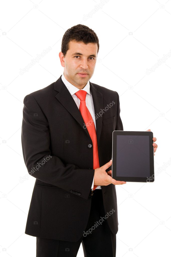Smiling young business man with tablet pc. Isolated over white b