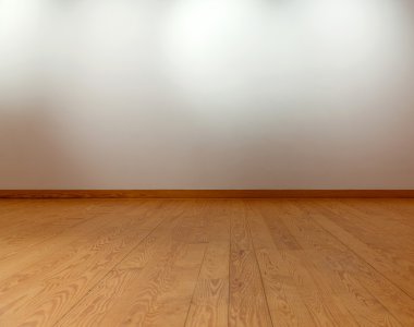 Empty white wall with spot lights and wooden floor clipart