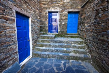 Detail of three blue doors at the ancient village of Piodao, Arg