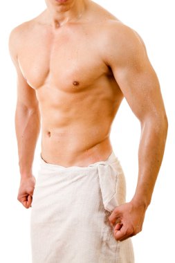 Beautiful muscular man after bath. clipart